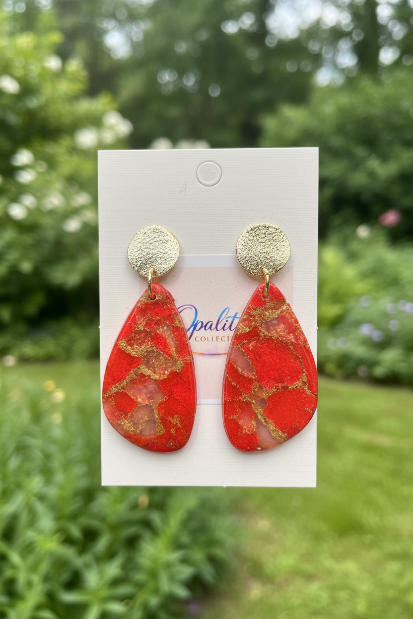 Red & Gold Earrings with Garden Background
